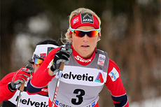 Therese Johaug gikk offensivt på 4. etappe av Tour de Ski 2011/2012 i Oberstdorf og ble belønnet med bonussekunder underveis og 3. plass på etappen. Foto: Hemmersbach/NordicFoucs.