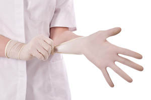 bs_Pulling_on_surgical_glove_prostate-300