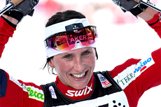 Marit Bjørgen på toppen av monsterbakken i Val di Fiemme etter å ha jobbet seg inn til 2. plass i Tour de Ski 2011/2012. Foto: Hemmersbach/NordicFocus.