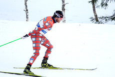 Martin Johnsrud Sundby holder full fart gjennom langesonen under 30 km skiathlon på NM i Voss 2012. Foto: Geir Nilsen/Langrenn.com.