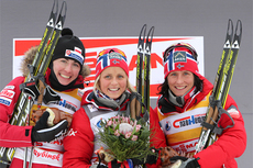 Seierspallen på 15 km skiathlon i Rybinsk 2012. Fra venstre: Justyna Kowalczyk (2), Therese Johaug (1) og Marit Bjørgen (3). Foto: Hemmersbach/NordicFocus. Seierspallen på 15 km skiathlon i Rybinsk 2012. Fra venstre: Justyna Kowalczyk (2), Therese Johaug (1) og Marit Bjørgen (3). Foto: Hemmersbach/NordicFocus.