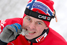 Johan Kjølstad med sin sølvmedalje fra VM-sprinten i Liberec 2009. Foto: Hemmersbach/NordicFocus.
