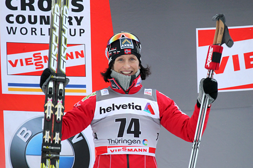 Fornøyd Marit Bjørgen selv om det manglet 4 tideler opp til Justyna Kowalczyk med tanke på seieren i Tour de Ski-prologen 2011/2012. Foto: Hemmersbach/NordicFocus. Fornøyd Marit Bjørgen selv om det manglet 4 tideler opp til Justyna Kowalczyk med tanke på seieren i Tour de Ski-prologen 2011/2012. Foto: Hemmersbach/NordicFocus.