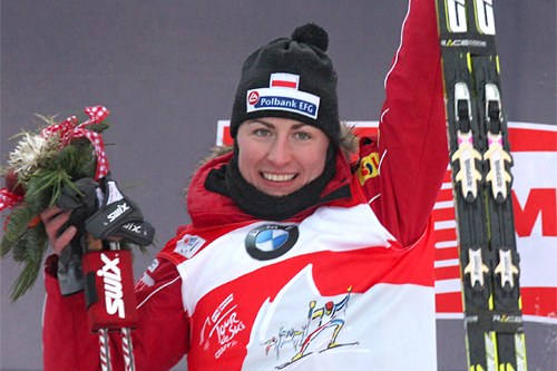 Justyna Kowalczyk jubler etter å tatt sin tredje etappeseier på rad i Tour de Ski 2011/2012. Foto: Hemmersbach/NordicFocus. Justyna Kowalczyk jubler etter å tatt sin tredje etappeseier på rad i Tour de Ski 2011/2012. Foto: Hemmersbach/NordicFocus.