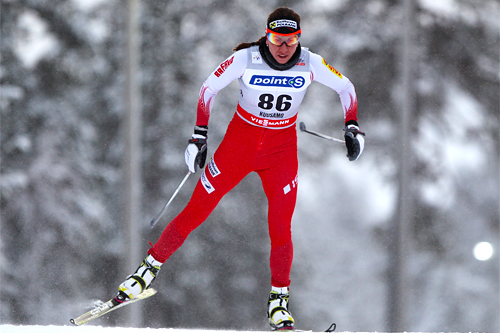 Justyna Kowalczyk på vei mot 11. plass i verdenscupens 5 km fri i Kuusamo 2012. Foto: Laiho/NordicFocus. Justyna Kowalczyk på vei mot 11. plass i verdenscupens 5 km fri i Kuusamo 2012. Foto: Laiho/NordicFocus.