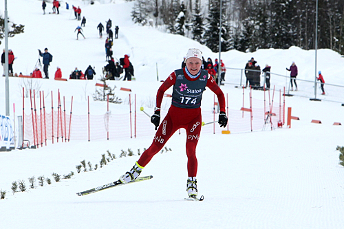Skiskytter Hilde Fenne går inn til suveren seier på 15 km fri for kvinner 19/20 år under NM for juniorer på Lillehammer 2013. Foto: Erik Borg. Skiskytter Hilde Fenne går inn til suveren seier på 15 km fri for kvinner 19/20 år under NM for juniorer på Lillehammer 2013. Foto: Erik Borg.