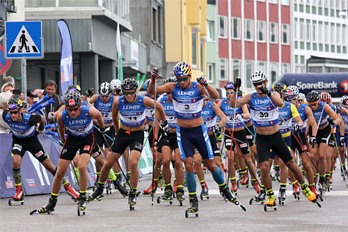 Herrenes fellesstart over 15 km på åpningsetappen i Kristiansund under Toppidrettsveka 2014. Foto: Geir Nilsen/Langrenn.com. Herrenes fellesstart over 15 km på åpningsetappen i Kristiansund under Toppidrettsveka 2014. Foto: Geir Nilsen/Langrenn.com.