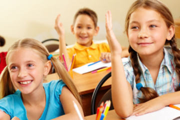 Image of pupils raising arms during the lesson