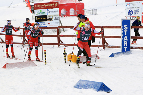 Fra Junior-NM 2014 på Mo i Rana, med Nes Ski sin Amalie Håkonsen Ous på vei ut fra start. Foto: Erik Borg. Fra Junior-NM 2014 på Mo i Rana, med Nes Ski sin Amalie Håkonsen Ous på vei ut fra start. Foto: Erik Borg.