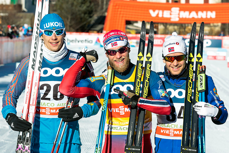 Martin Johnsrud Sundby (midten) viste muskler og vant den klassiske 15-kilometeren under verdenscupen i Toblach 2015 foran Alexander Bessmertnykh (t.v.) og Sjur Røthe. Foto: Modica/NordicFocus. Martin Johnsrud Sundby (midten) viste muskler og vant den klassiske 15-kilometeren under verdenscupen i Toblach 2015 foran Alexander Bessmertnykh (t.v.) og Sjur Røthe. Foto: Modica/NordicFocus.