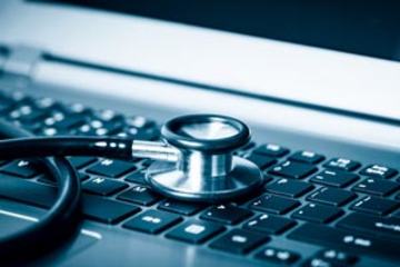 Computer or data analysis - Stethoscope over a laptop computer k