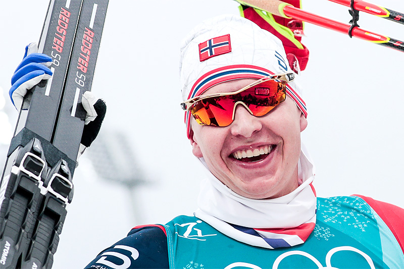 Simen Hegstad Krüger jubler etter å ha vunnet OL-gull på 30 km skiathlon i Pyeongchang 2018. Foto: Modica/NordicFocus. Simen Hegstad Krüger jubler etter å ha vunnet OL-gull på 30 km skiathlon i Pyeongchang 2018. Foto: Modica/NordicFocus.