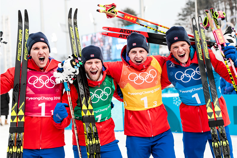 Norges gullgutter fra OL-stafetten i Pyeongchang 2018. Fra venstre: Didrik Tønseth (1. etappe), Martin Johnsrud Sundby (2), Simen Hegstad Krüger (3) og Johannes Høsflot Klæbo (4). Foto: Modica/NordicFocus. Norges gullgutter fra OL-stafetten i Pyeongchang 2018. Fra venstre: Didrik Tønseth (1. etappe), Martin Johnsrud Sundby (2), Simen Hegstad Krüger (3) og Johannes Høsflot Klæbo (4). Foto: Modica/NordicFocus.