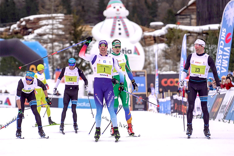 Dario Cologna tok spurten i Engadin Skimarathon 2019, som også inngikk i Ski Classics. I grønt ser vi Anders Gløersen som kapret 3. plassen. Foto: Tom William Lindström / Visma Ski Classics. Dario Cologna tok spurten i Engadin Skimarathon 2019, som også inngikk i Ski Classics. I grønt ser vi Anders Gløersen som kapret 3. plassen. Foto: Tom William Lindström / Visma Ski Classics.