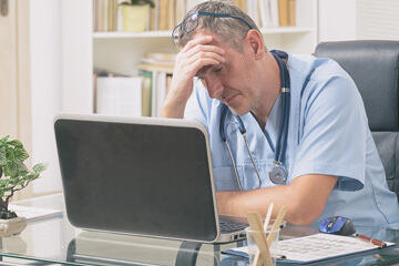 bs-Overworked-doctor--345030529-360