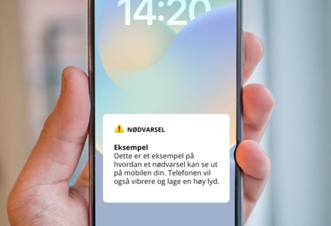 illustrasjon om hvordan et nødvarsel vises på mobilen din.