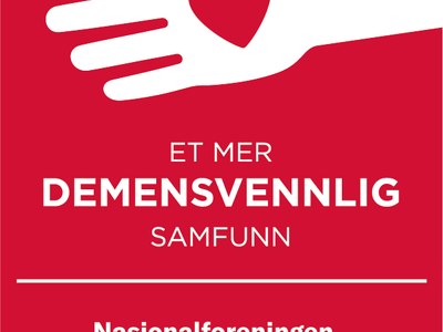 Bildet viser en rød logo med hvit skrift om demensvennlig samfunn